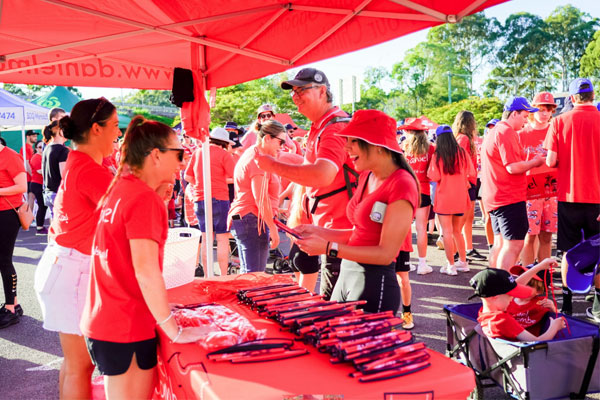 Daniel Morcombe Foundation handing out merchandise 